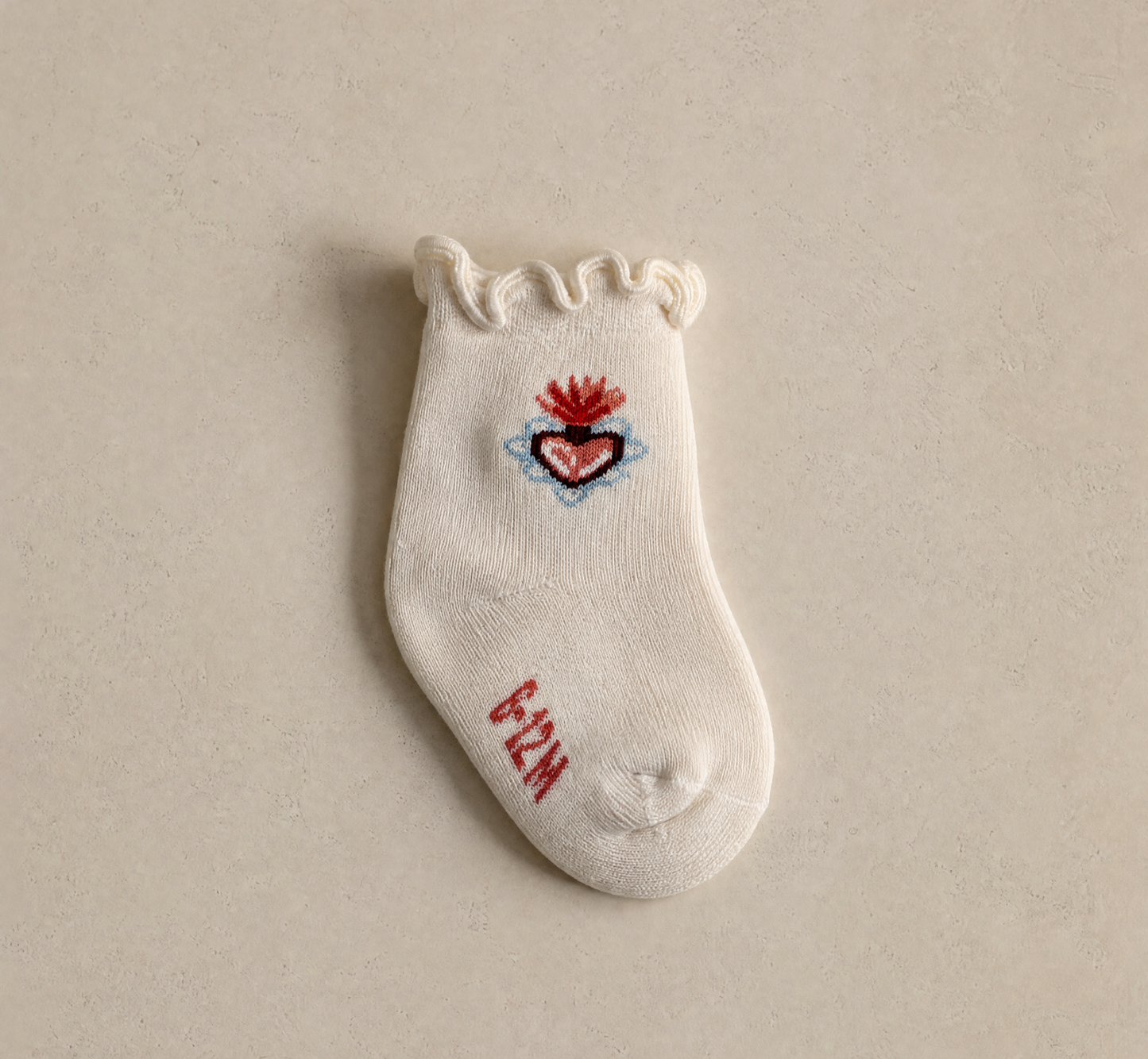 Cream sock with pink and blue flaming heart graphic