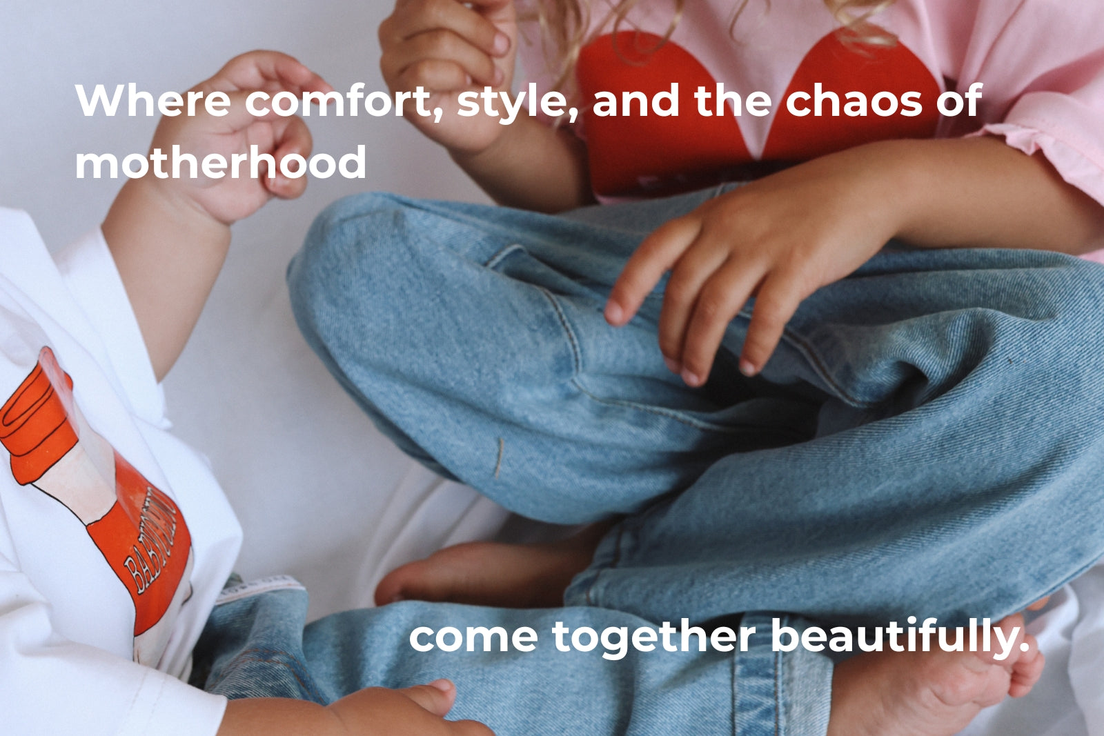 Two people sitting together with text overlay about comfort, style, and motherhood.