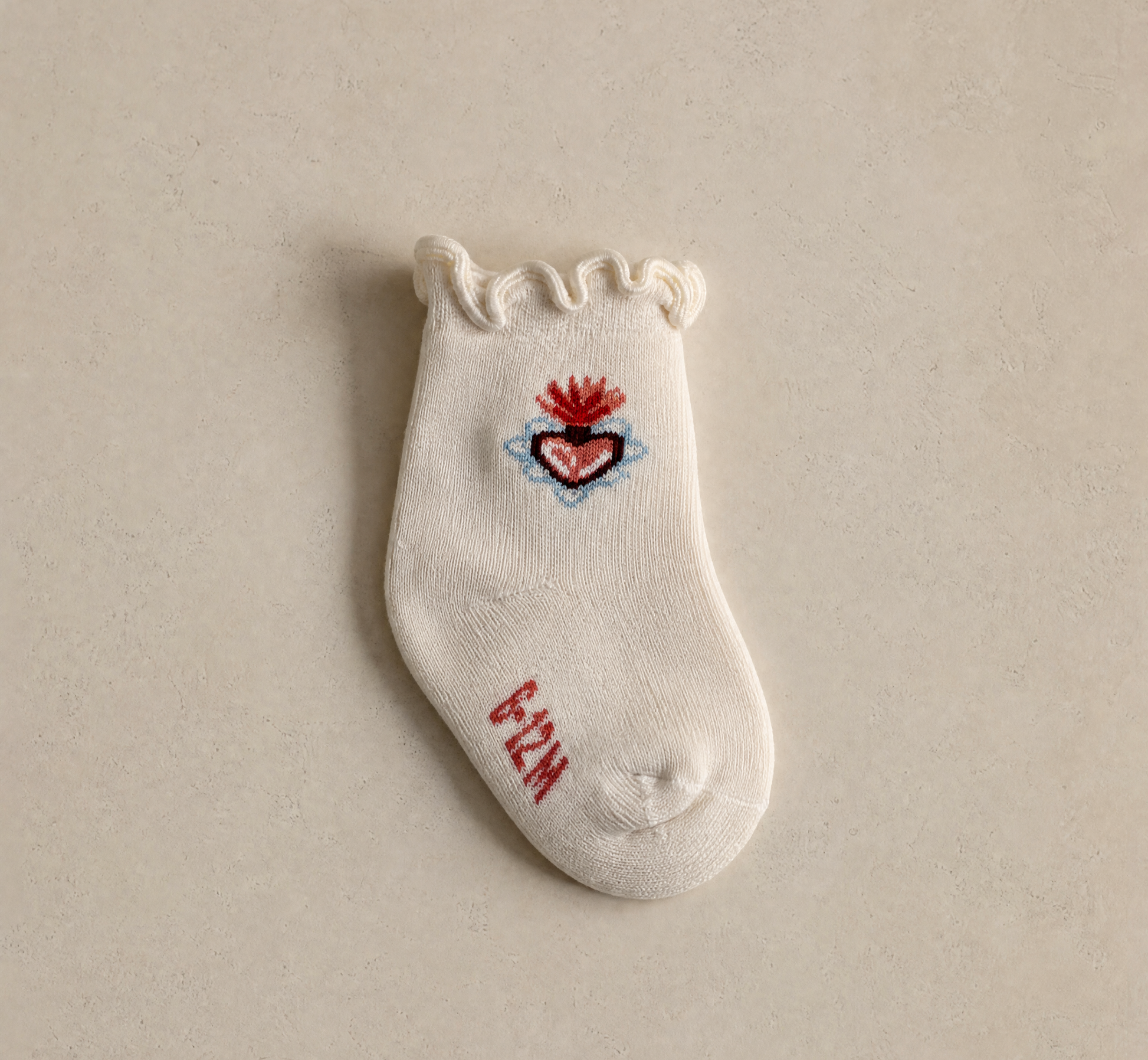 Cream sock with pink and blue flaming heart graphic