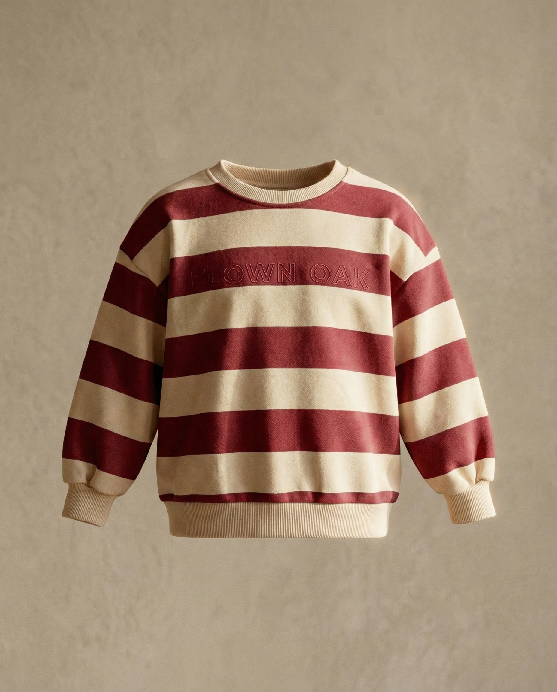 Red and beige striped sweater on a beige background