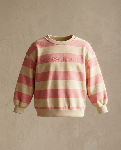 Striped sweater with 'DOWN' text on a beige background